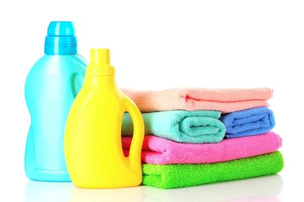 Detergent and towels isolated on white — Stock Photo, Image