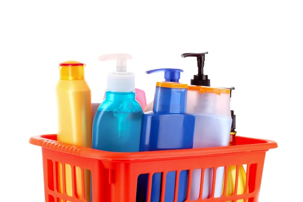 Flaskor av skönhet och bad produkter i orange box isolerad på wh — Stockfoto