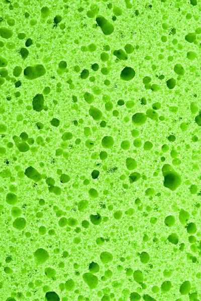 Limpeza da superfície da esponja close-up — Fotografia de Stock