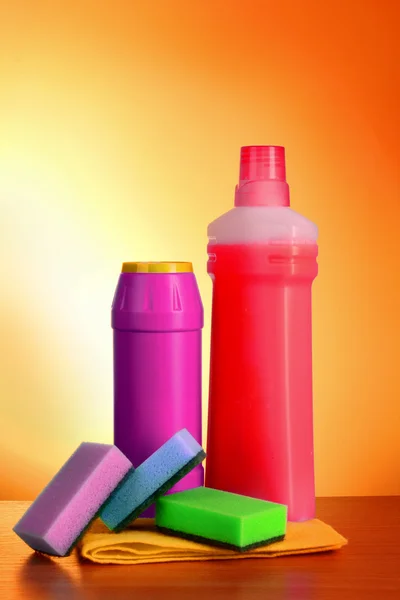 Assorted cleaning products on yellow background — Stock Photo, Image