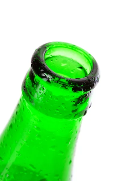 Macro shot of beer bottle with water drops isolated on white — Stock Photo, Image
