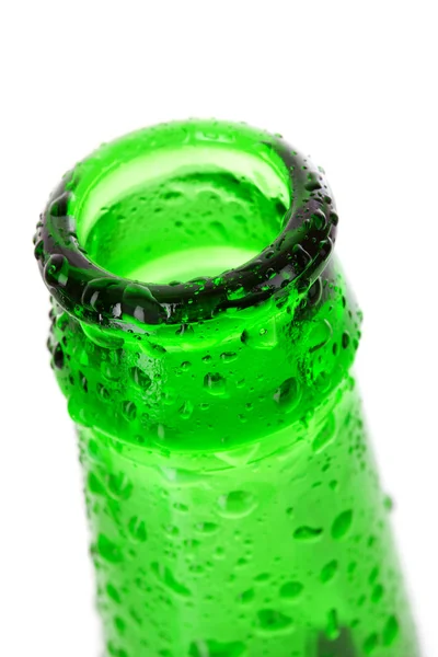Macro shot of beer bottle with water drops isolated on white — Stock Photo, Image