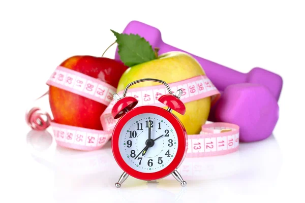 Relógio despertador, maçã e halteres — Fotografia de Stock
