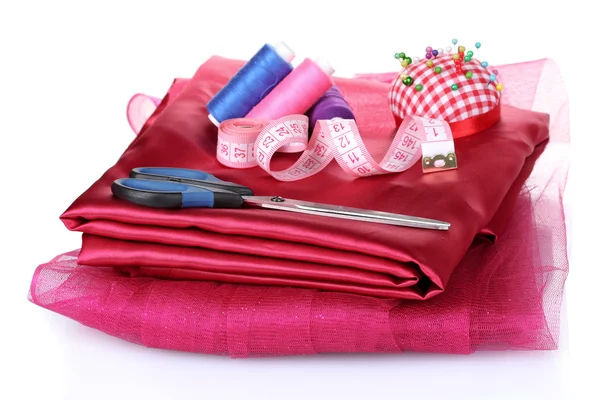 Červené, modré a růžové vlákno, měřicí pásky a tkaniny — Stock fotografie