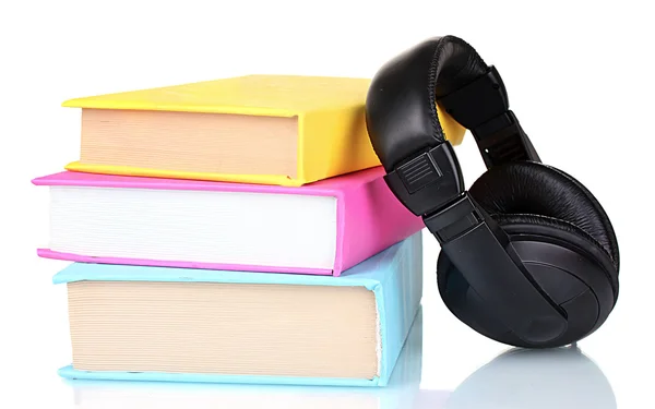 Headphones on book — Stock Photo, Image