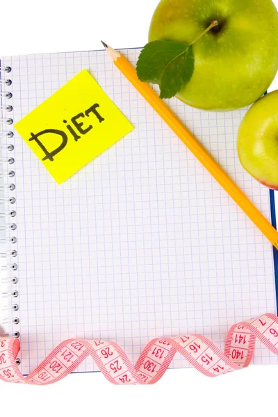 Σχεδιασμό μιας δίαιτας. σημειωματάριο, μολύβι και φρέσκα μήλα που απομονώνονται σε λευκό — Φωτογραφία Αρχείου