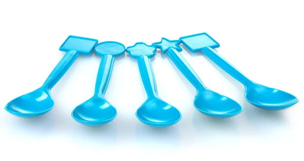 Cucharas de plástico azul — Foto de Stock