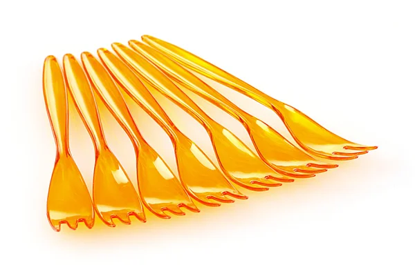 Желтые пластиковые вилки — стоковое фото