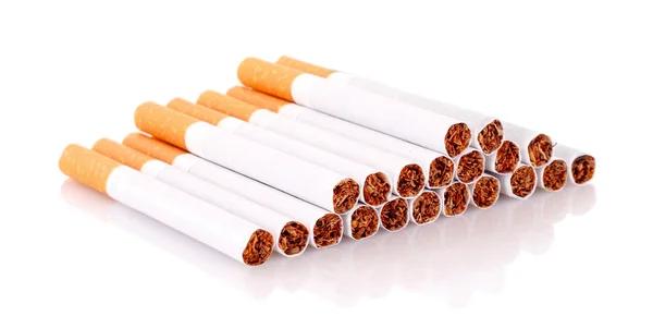 Muitos cigarros isolados em branco — Fotografia de Stock