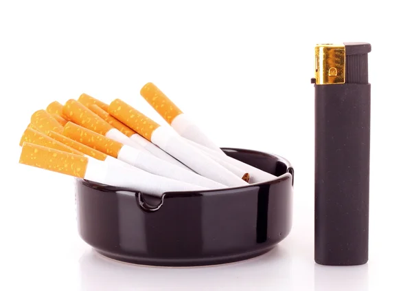 Many cigarettes isolated on white — Stock Photo, Image