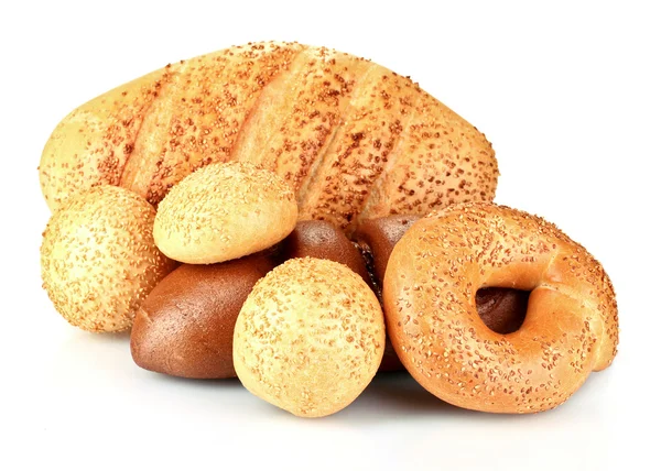 Bread and buns with sesame seeds and spikelets — Stock Photo, Image