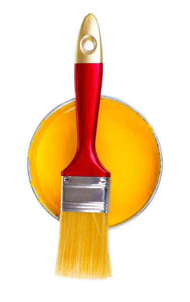 Otevřít konzervu žluté barvy a štětce — Stockfoto