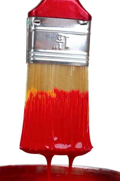 Brush with bright red paint — Stock Photo, Image