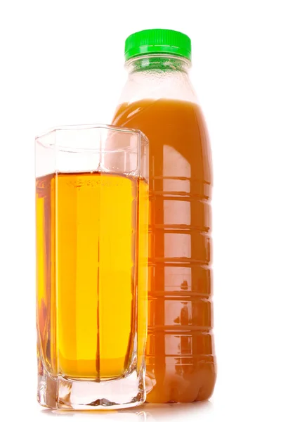 Glass of juice and bottle isolated on white — Stock Photo, Image