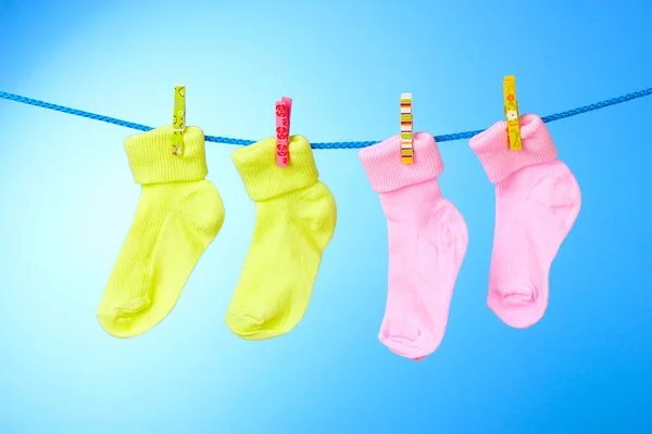 Children's socks on a rope — Stock Photo, Image