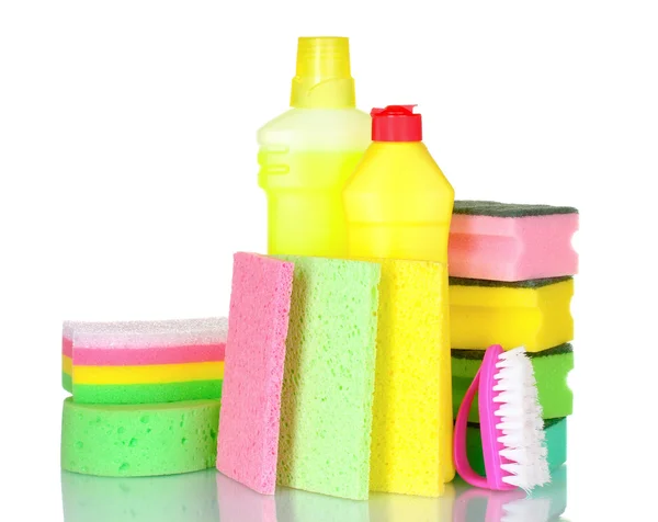 Detergent bottles, brush and sponges — Stock Photo, Image