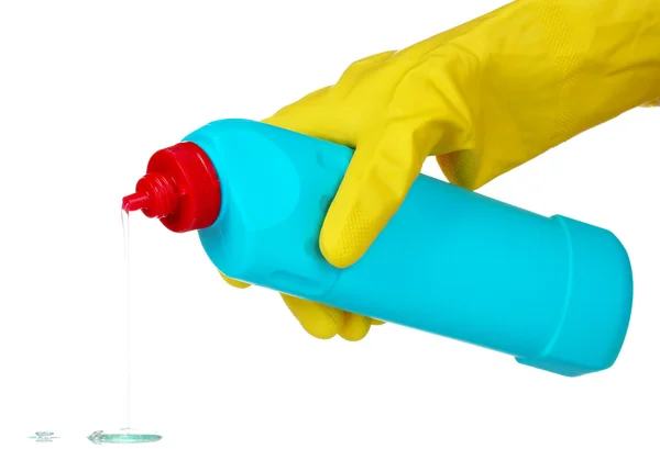 Detergent bottle in hand — Stock Photo, Image