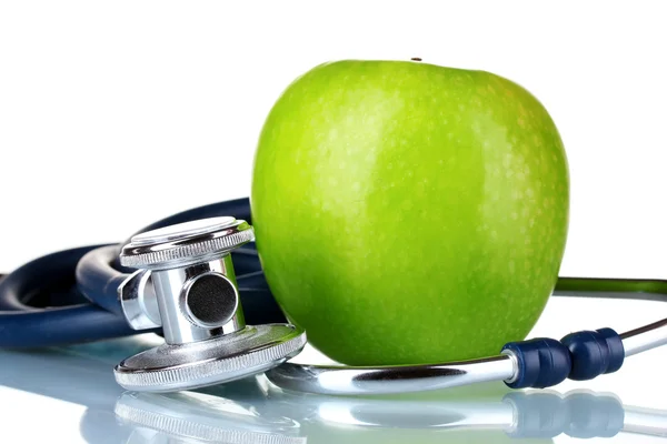 Медицинский стетоскоп и яблоко — стоковое фото