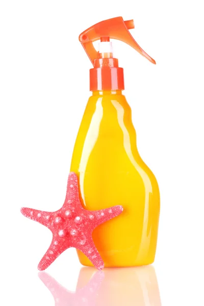 Sonnencreme in Flaschen und Seesterne — Stockfoto