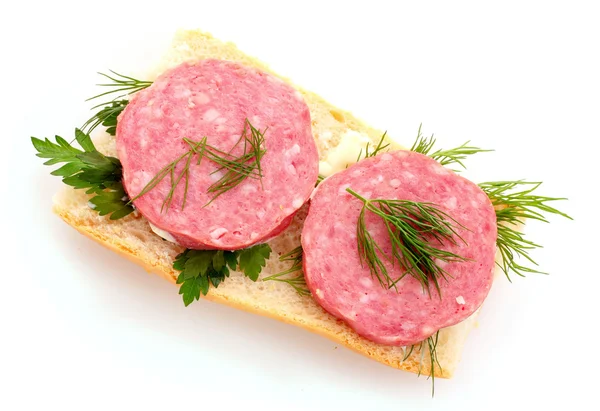 Sausage on bread isolated on white — Stock Photo, Image