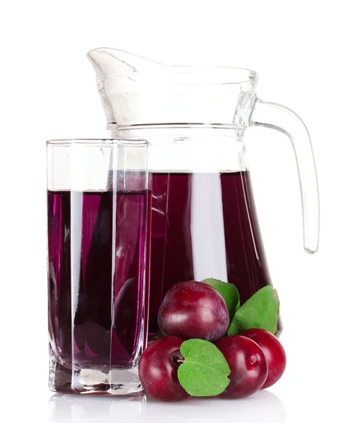 Pitcher and glass of compote and plums — Stock Photo, Image