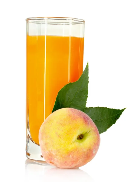 Fresh peaches and glass with juice — Stock Photo, Image