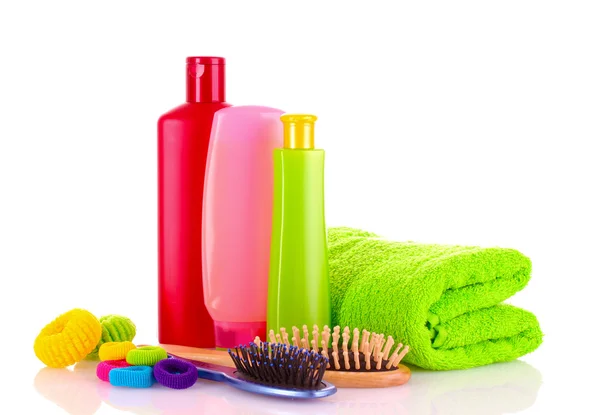 Shampoo bottles and hair brush on white — Stock Photo, Image