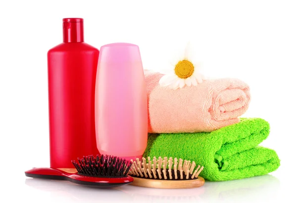 Shampoo bottles and hair brush on white — Stock Photo, Image