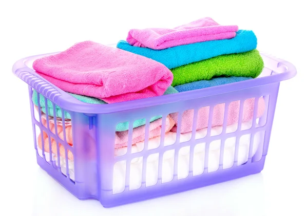 Basket with towels isolated on white — Stock Photo, Image