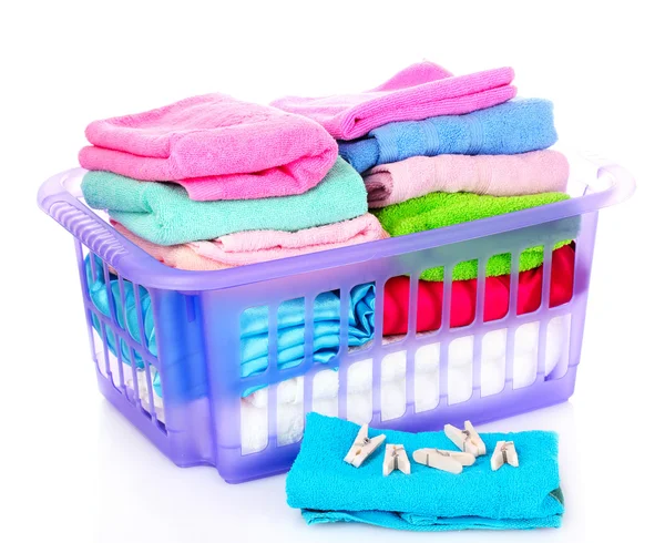 Towels in basket isolated on white — Stock Photo, Image