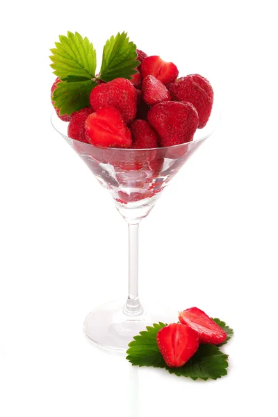 Many strawberries in glass isolated on white — Stock Photo, Image