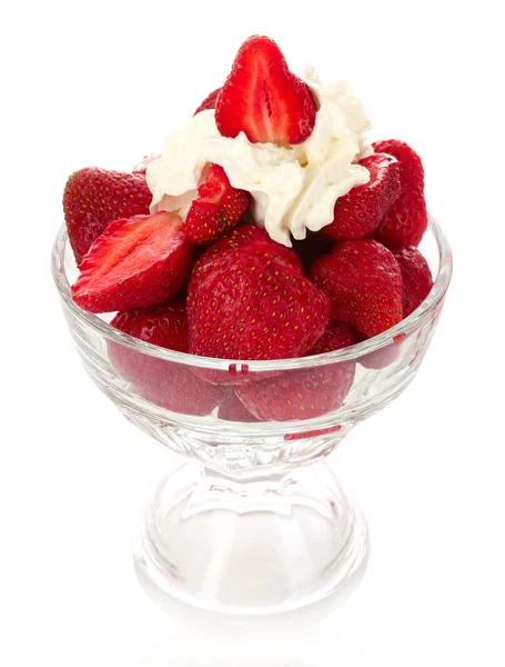 Many strawberries in glass with cream isolated on white — Stock Photo, Image