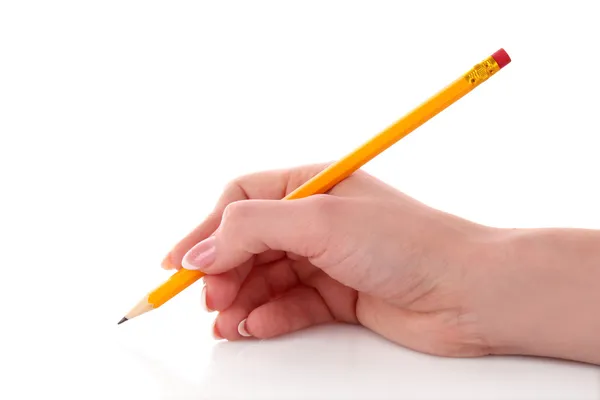 Kvinna hand skriva gul trä blyertspenna — Stockfoto