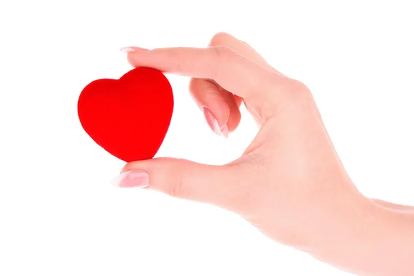 Corazón rojo en la mano aislado en blanco — Foto de Stock
