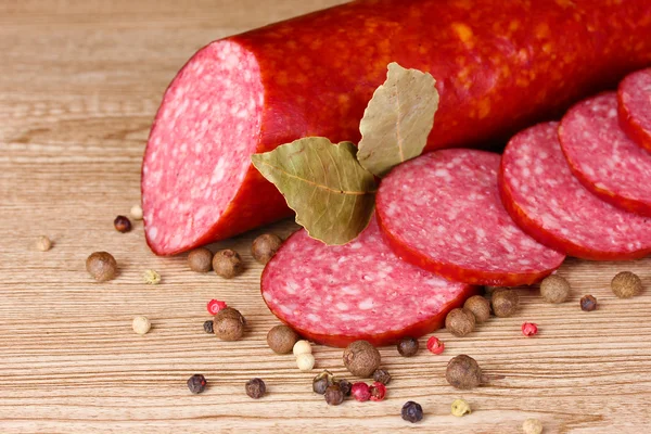 Tasty sausage and spices — Zdjęcie stockowe
