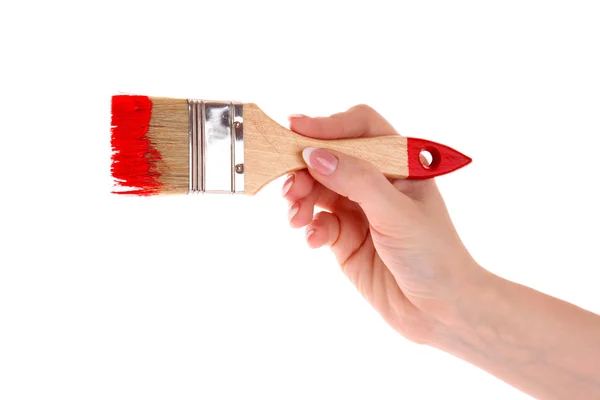 用画笔和红漆上白色隔离手 — 图库照片