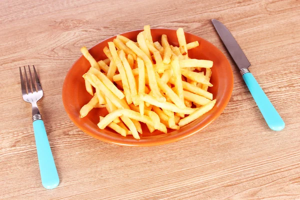 French fries and cutlery — Stock Photo, Image