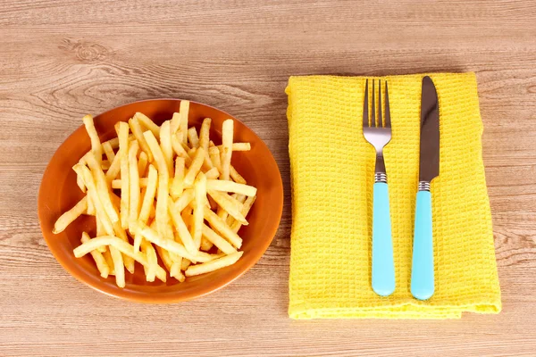 French fries and cutlery — Stock Photo, Image