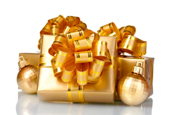 Beautiful golden gifts — Stock Photo, Image
