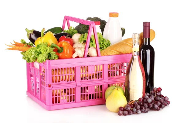 Grönsaker och vin i en korg — Stockfoto