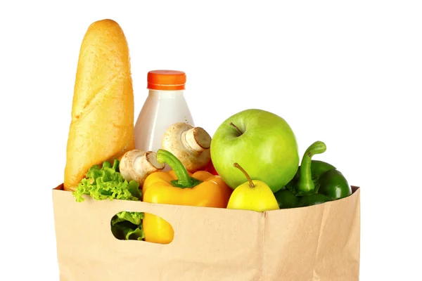 Sebzeler üzerinde beyaz izole kağıt çanta — Stok fotoğraf