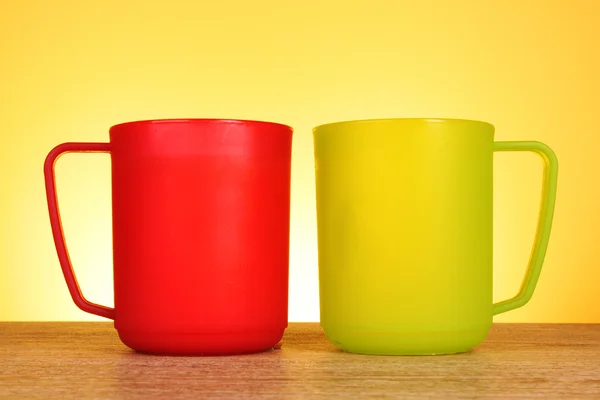 Two cups on red background — Stock Photo, Image