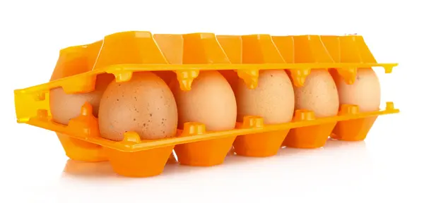 Eggs in plastic box isolated on white — Stock Photo, Image