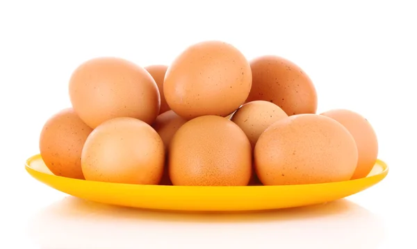 Ägg i plattan isolerad på vit — Stockfoto