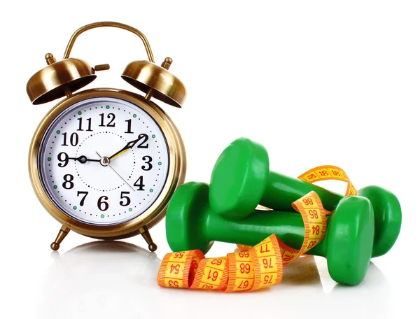 stock image Old alarm-clock, dumbbells and measure tape