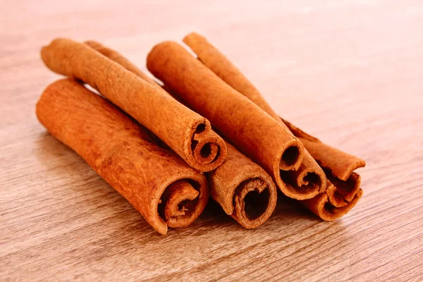 Cinnamon bark on wooden table — Stock Photo, Image