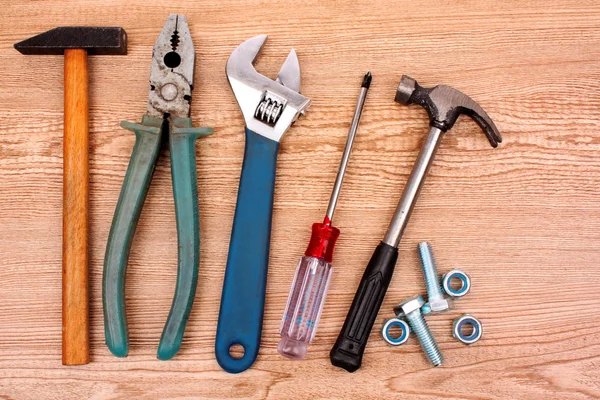 Tools on wooden surface — Stock Photo, Image