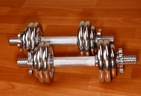 Dumbbell on the floor — Stock Photo, Image