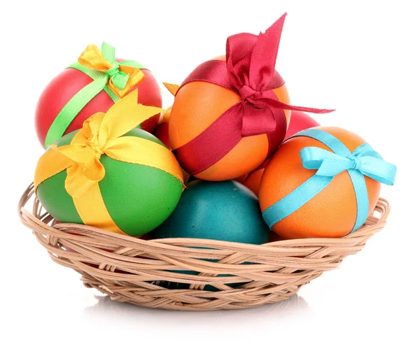 Easter eggs in basket isolated on white — Stock Photo, Image