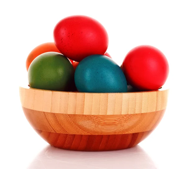 Easter eggs in wooden bowl isolated on white — Stock Photo, Image